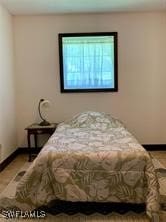 601 E Del Monte Ave, Clewiston, FL 33440 - bedroom with baseboards