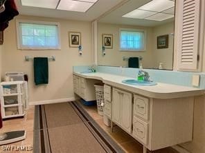 bathroom with a wealth of natural light and sink