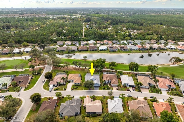 bird's eye view featuring a water view and a residential view