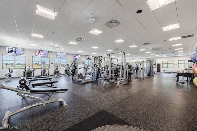 workout area with visible vents and a drop ceiling