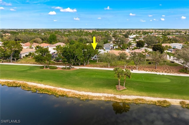 view of property's community featuring a residential view, view of golf course, and a water view