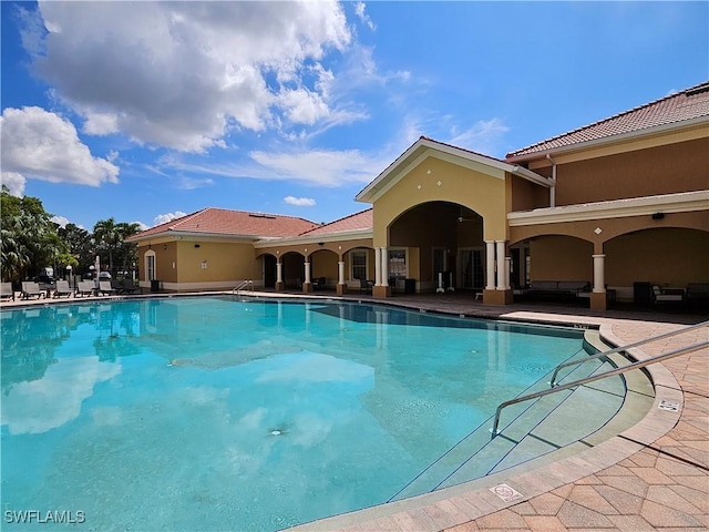 view of pool featuring an outdoor hangout area and a patio