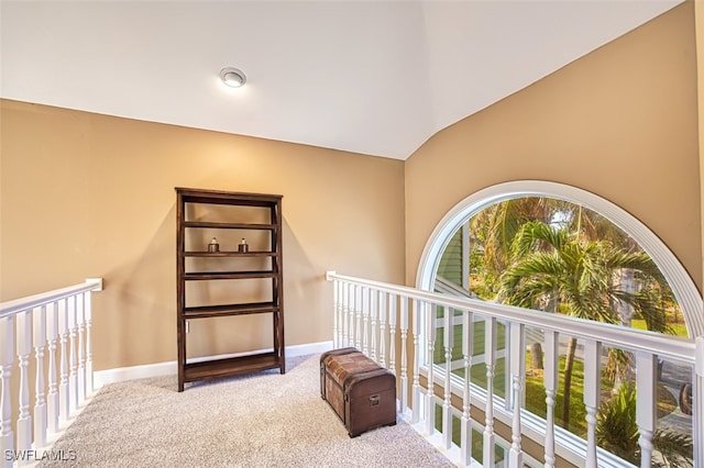 bedroom with carpet and vaulted ceiling