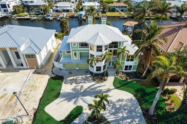 18141 Old Pelican Bay Dr, Fort Myers Beach, FL 33931 - aerial view of residential area featuring a large body of water