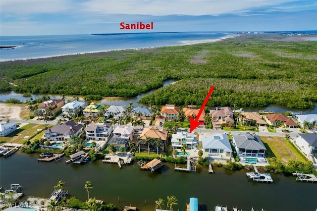 18141 Old Pelican Bay Dr, Fort Myers Beach, FL 33931 - aerial perspective of suburban area with a nearby body of water