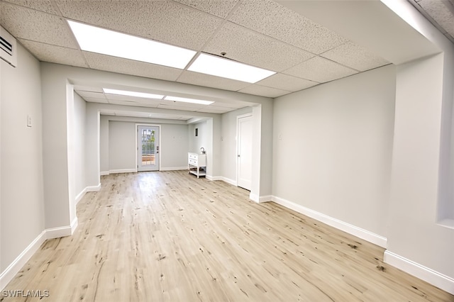 18141 Old Pelican Bay Dr, Fort Myers Beach, FL 33931 - empty room with a paneled ceiling and wood finished floors