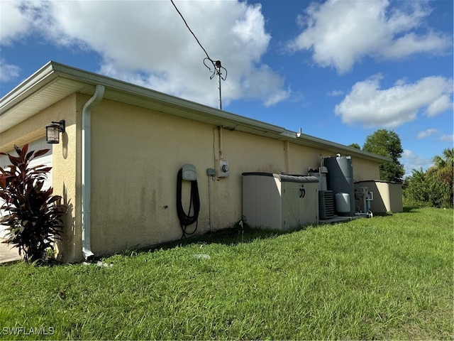 view of home's exterior featuring a yard