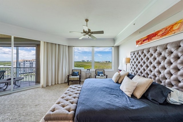 bedroom with carpet flooring, access to exterior, ceiling fan, and ornamental molding