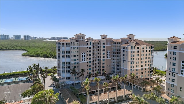 view of building exterior with a water view