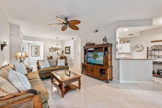 4705 Hawks Nest Way Unit 103, Naples, FL 34114 - living area with light tile patterned flooring, visible vents, baseboards, and ceiling fan with notable chandelier