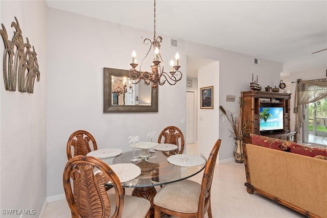 4705 Hawks Nest Way Unit 103, Naples, FL 34114 - dining room featuring baseboards, visible vents, an inviting chandelier, and light tile patterned floors