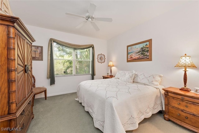 4705 Hawks Nest Way Unit 103, Naples, FL 34114 - bedroom featuring baseboards, carpet floors, and ceiling fan