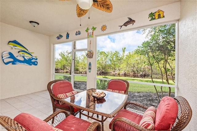 4705 Hawks Nest Way Unit 103, Naples, FL 34114 - sunroom with tile patterned flooring and a ceiling fan