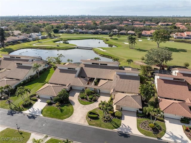 bird's eye view with a residential view, view of golf course, and a water view