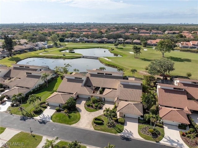 bird's eye view with a residential view, golf course view, and a water view