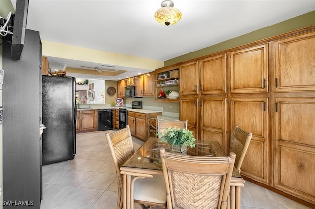 dining area featuring light tile patterned flooring