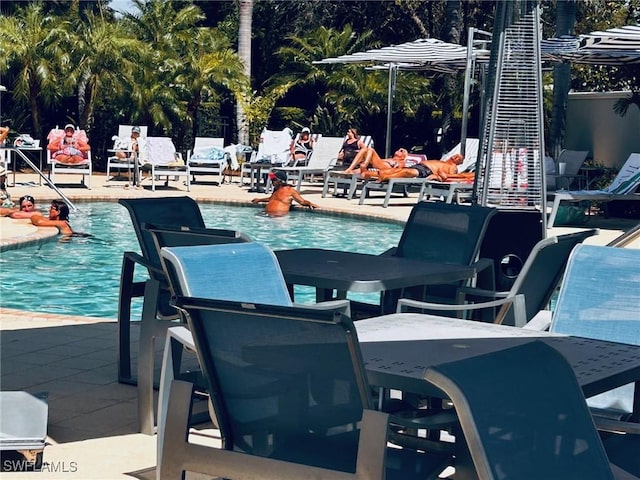 pool featuring a patio area