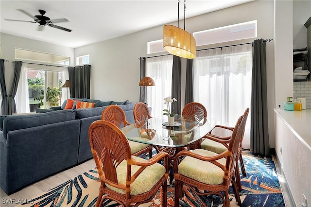 dining space with ceiling fan