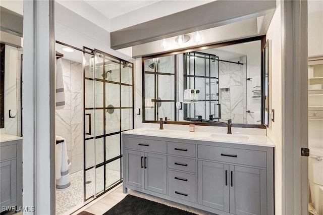 bathroom featuring vanity and walk in shower