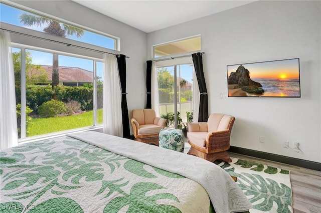 bedroom with light wood-type flooring