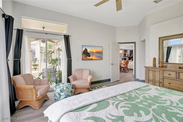 bedroom with access to outside, ceiling fan, and light hardwood / wood-style floors