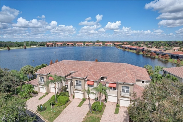 birds eye view of property featuring a water view