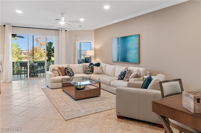 tiled living room featuring ornamental molding and ceiling fan