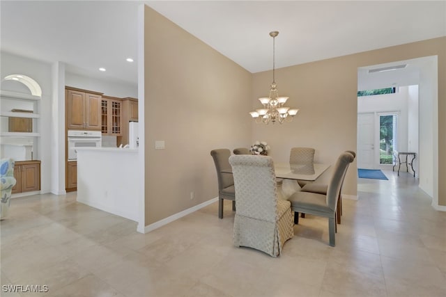 dining area with a notable chandelier