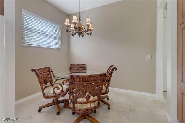 9246 Springview Loop, Estero, FL 33928 - dining space featuring a chandelier, baseboards, and light tile patterned flooring