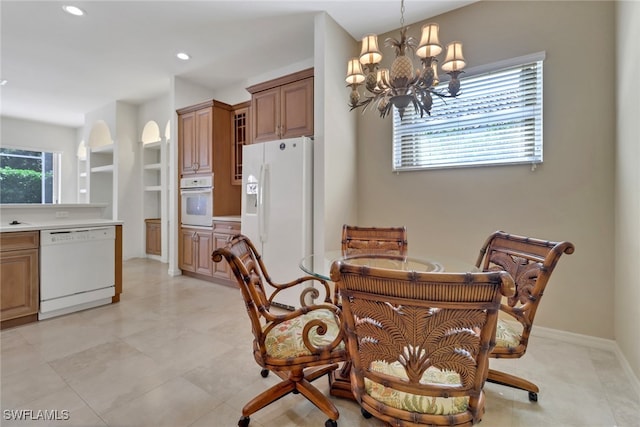 dining room with a chandelier