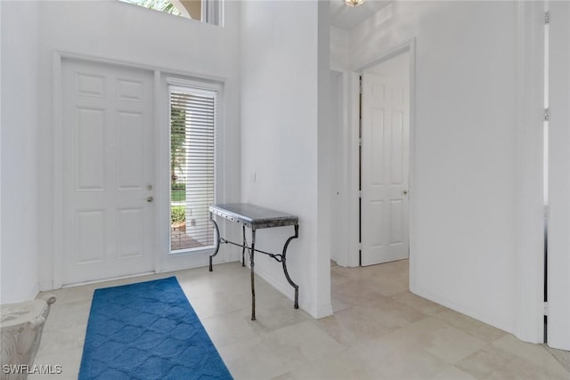 9246 Springview Loop, Estero, FL 33928 - foyer with healthy amount of natural light and baseboards