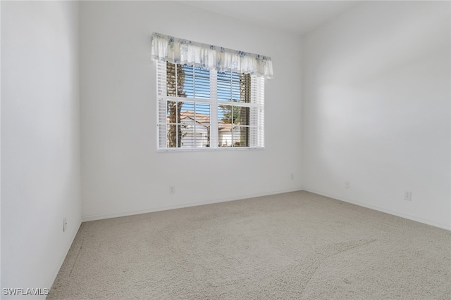 spare room with carpet flooring