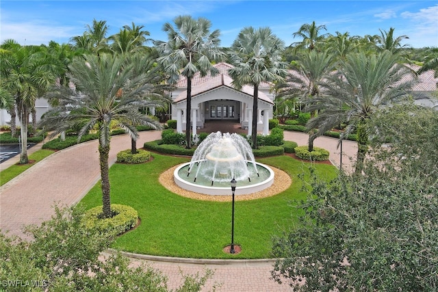 9246 Springview Loop, Estero, FL 33928 - view of home's community with a yard