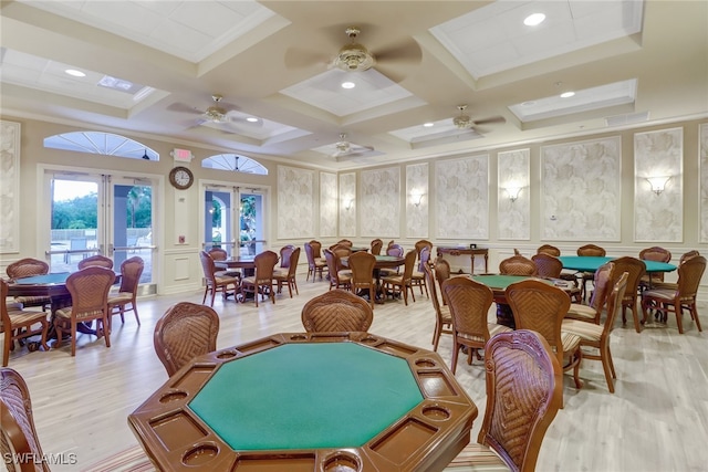 9246 Springview Loop, Estero, FL 33928 - rec room with a decorative wall, light wood finished floors, coffered ceiling, ceiling fan, and beam ceiling