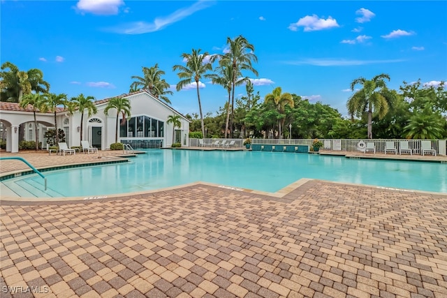 view of swimming pool featuring a patio area