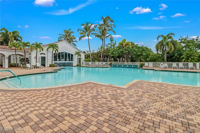9246 Springview Loop, Estero, FL 33928 - community pool featuring a patio area