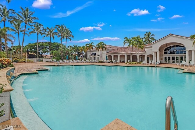 9246 Springview Loop, Estero, FL 33928 - community pool featuring a patio