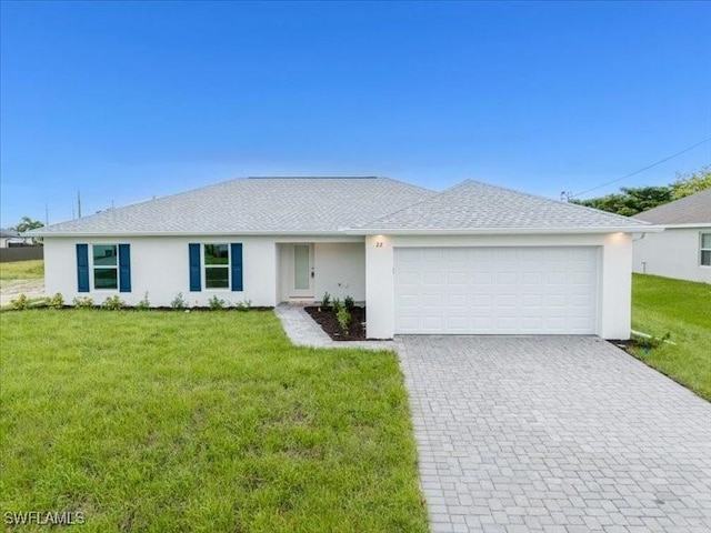 ranch-style home with a front lawn and a garage