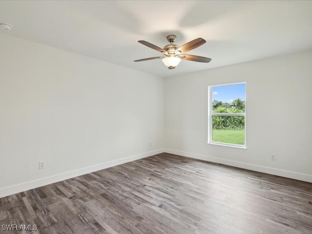 unfurnished room featuring hardwood / wood-style flooring and ceiling fan