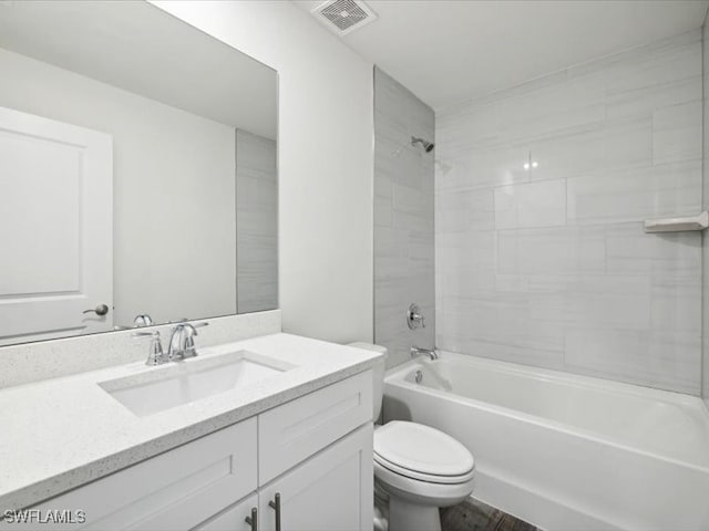 full bathroom with toilet, shower / washtub combination, and vanity