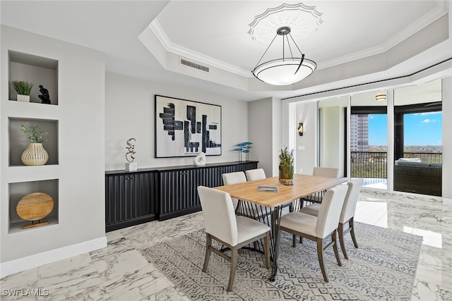 dining room with crown molding