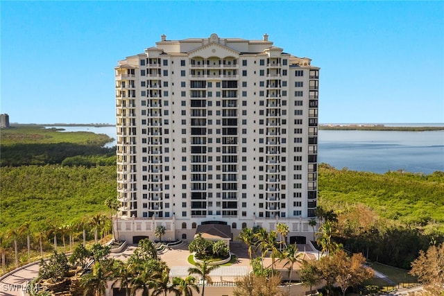 view of building exterior featuring a water view