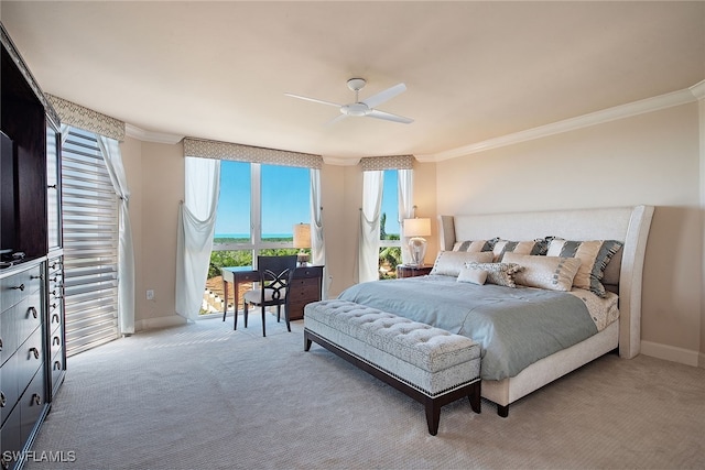 bedroom featuring ceiling fan, light colored carpet, and crown molding