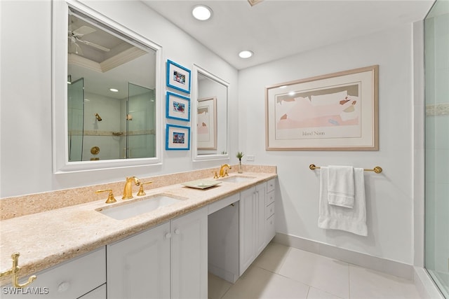 bathroom featuring vanity, tile patterned floors, walk in shower, and ornamental molding