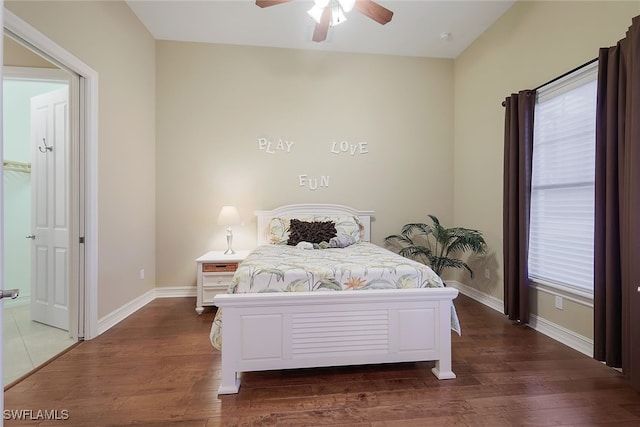 bedroom featuring ceiling fan and dark hardwood / wood-style flooring