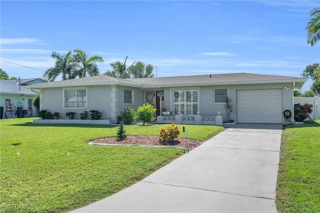 ranch-style home with a front lawn and a garage