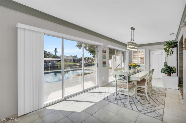 dining space with light tile patterned floors