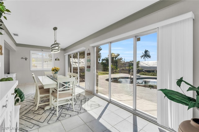 dining room featuring light tile patterned floors