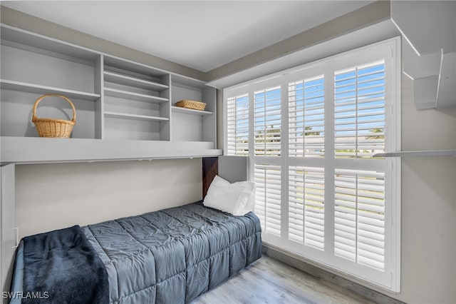 bedroom with light hardwood / wood-style floors