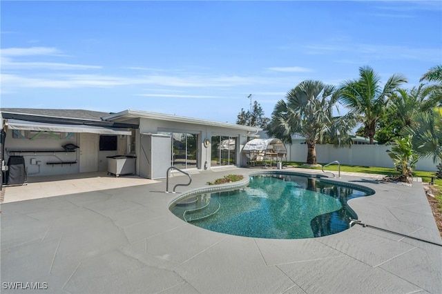 view of pool featuring a patio